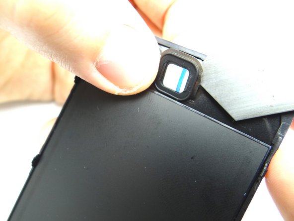 On the broken screen, use the iSesamo to lift up the home button.