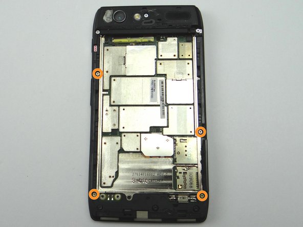 Remove four 4.0 mm gold T3 Torx screws and place into SLOT 4.