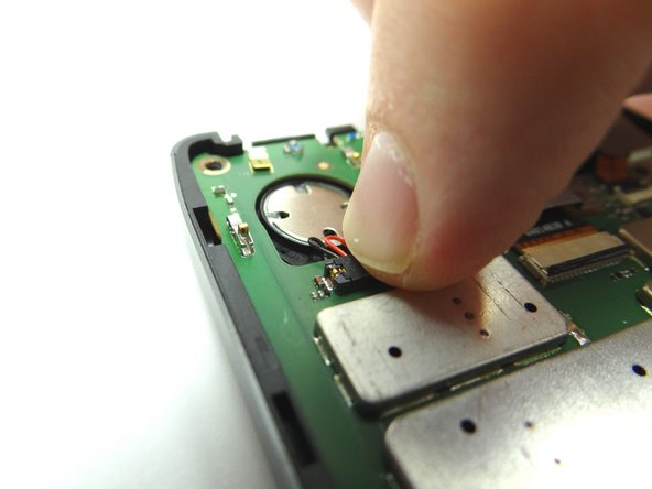 From COMPARTMENT D, replace speaker cover.