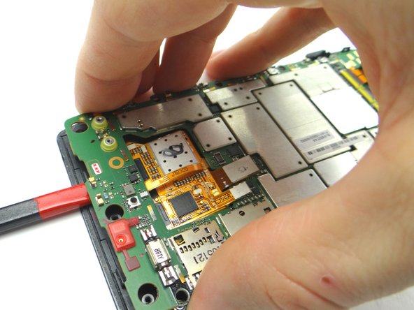 Only wedge the spudger where shown in the pictures.  Otherwise, you could break off fragile contacts on the bottom of the board.