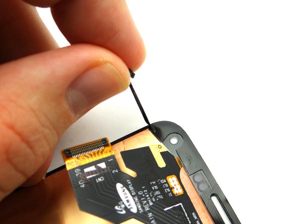 If you're reusing the screen: use the blue pry tool and your fingers to peel up the adhesive covering the perimeter of the underside of the screen.