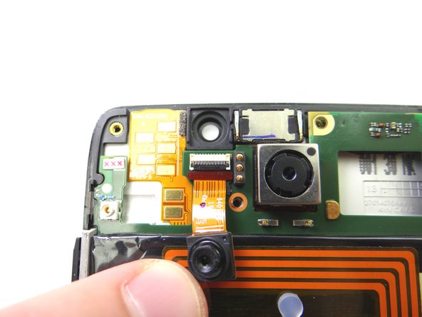 Pictures 2: Fold back the front-facing camera to access the ZIF connector.