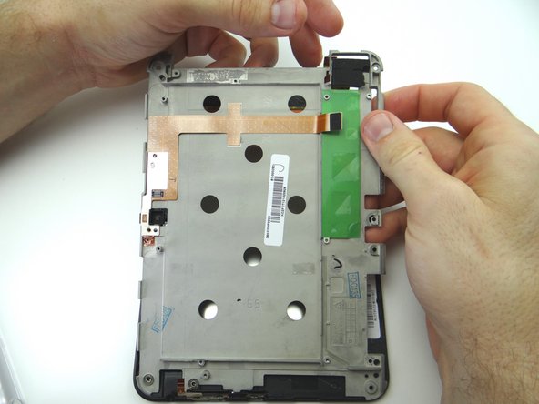 Continue lifting the mid-plate away from the display assembly.