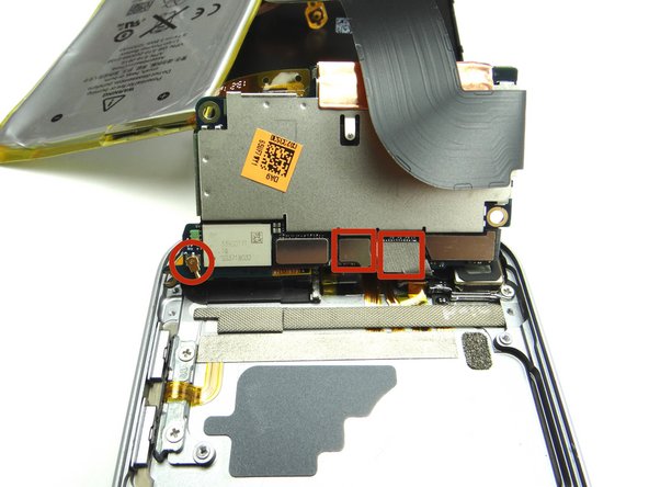 In the next step, you'll disconnect the three pictured cables.