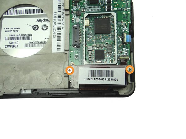 Picture 2: From SLOT 2, replace two 2.3 mm Phillips screws to secure the digitizer cable.