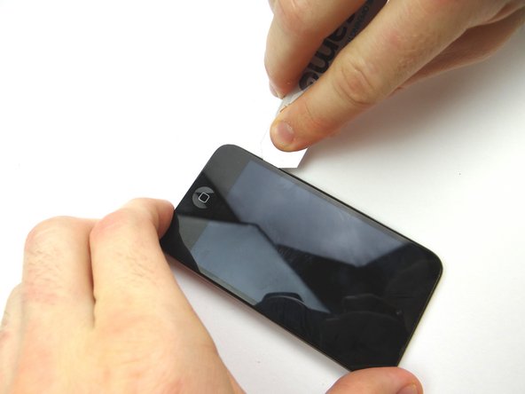 Picture 2: Pivot the iSesamo around the bottom left corner then work your way up the left edge.