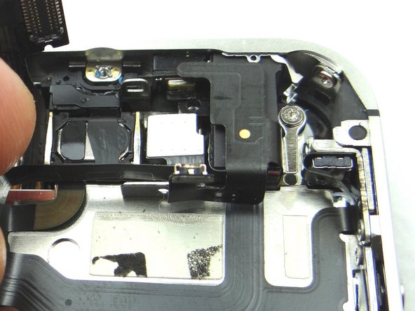 Place the front-facing camera, from COMPARTMENT D (or replacement part), in the open slot (red box notates where to place front-facing camera - Picture 1).