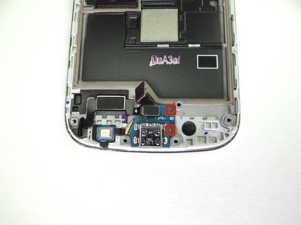 Picture 2: Make sure the openings on the charging port are lined up with the tabs on the front panel.  Press charging port firmly into place