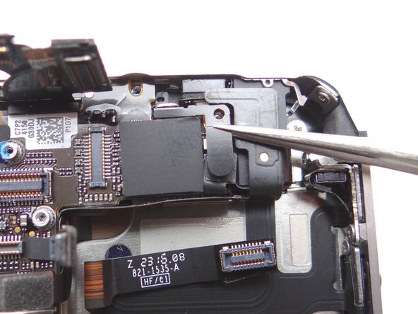 Picture 2: Replace the Antenna Shield from SLOT 9 using your fingers or Fine Point Tweezers.