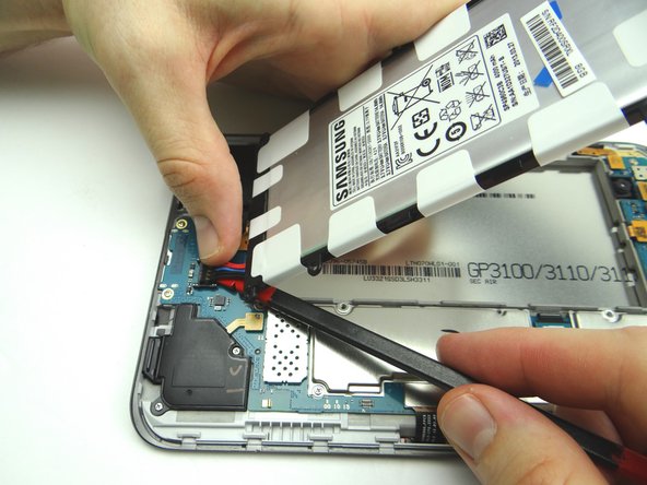 Pictures 1 &amp; 2: Use the flat end of the spudger to wedge under the battery connector.  With your thumb on top, lift straight up to disconnect the battery.
