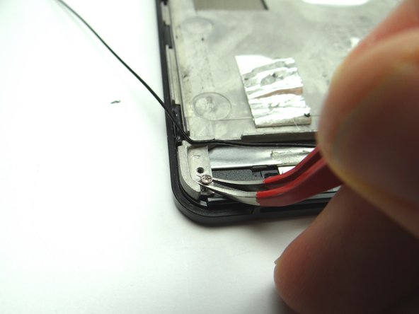 Use curved-tip tweezers to finish pulling up the screws if they get stuck.