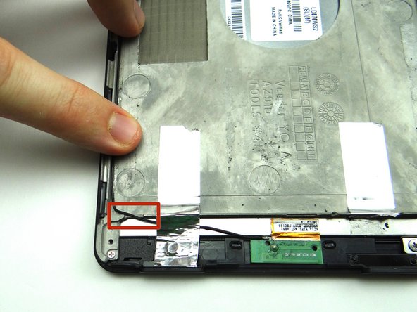 Picture 3: Place antenna cable along the left edge of the mid-plate.  Note the placement of the cable through the notch inside the red square.