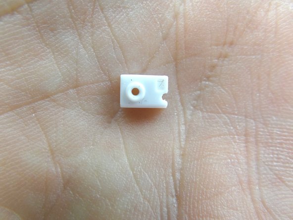 Remove microphone spacer and place it in SLOT 7.