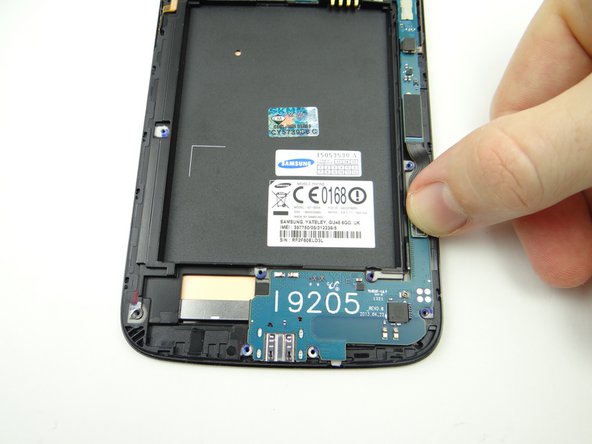 Connect soft keys cable to charging port daughter board.