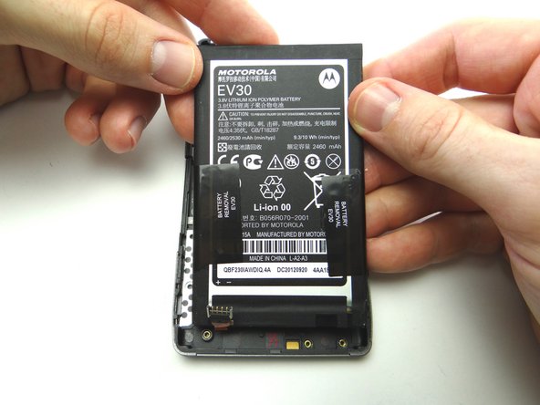 If you're repairing an HD MAXX you may have to use a spudger to push through the adhesive on the underside of the battery.