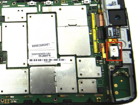 Picture 1: If loose, use your fingers to remove top microphone spacer.  Place in SLOT 7.