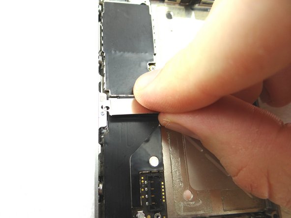 Picture 2: Replace the charging port assembly shield from SLOT 9.
