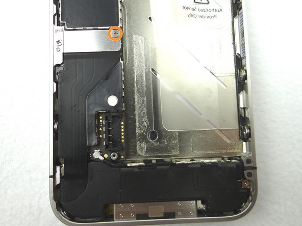 Picture 1: Replace the 1.6 mm Phillips screw from SLOT 9.