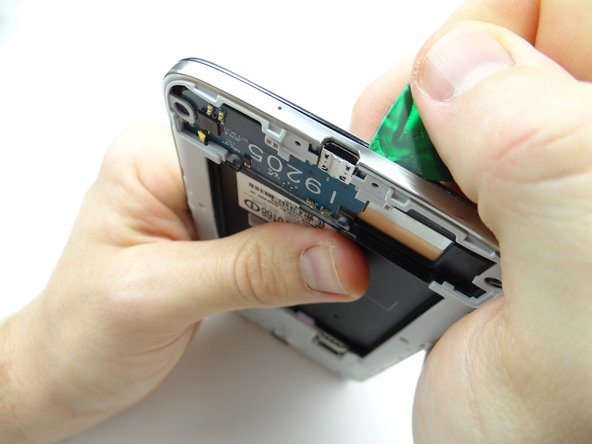 Note the Samsung warranty sticker (large circle) in the upper-left corner.  Remove it - there's a screw underneath.