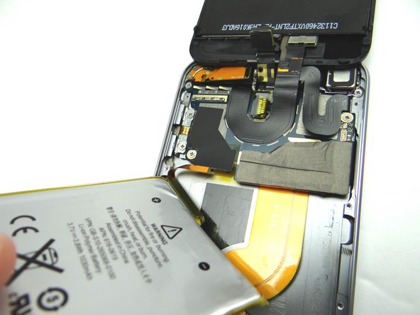 Picture 3: Rotate battery counter-clockwise into place.