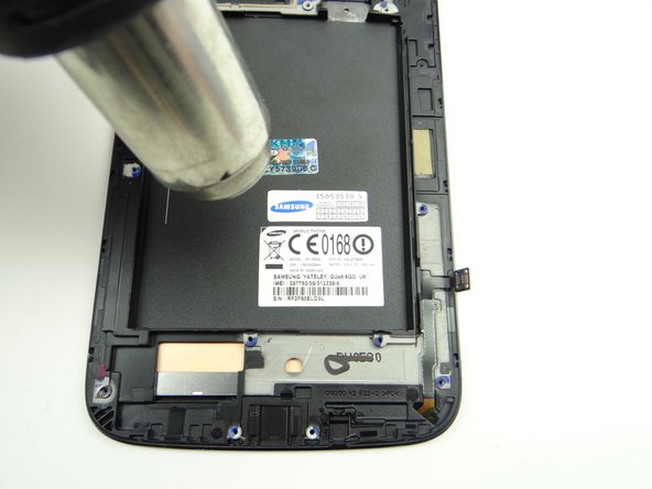 Have the replacement display ready before performing this step (so you can transfer IMEI sticker immediately):