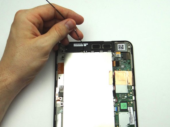 Picture 3: Peel up antenna cable.  Move it out of the way of the battery.