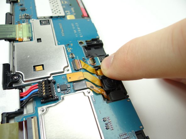 Push front-facing camera into its socket.