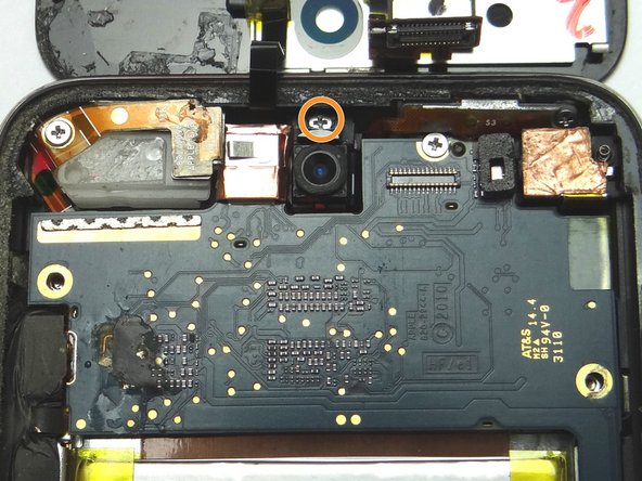 Picture 2: Remove one 2.0 mm Phillips screw and place into SLOT 8.