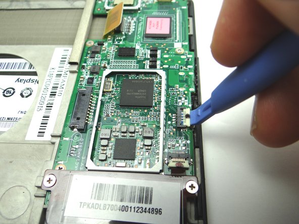 Picture 2: Open the ZIF connector securing the power button cable.