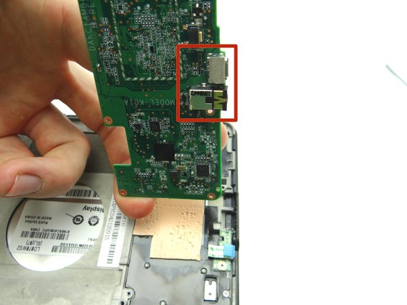 Replace logic board from ZONES II &amp; III.  Guide the charging port and headset jack in first: