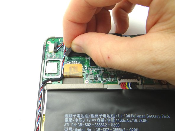 Picture 1: Peel up foam tape covering the speaker connector.  Place in COMPARTMENT A.