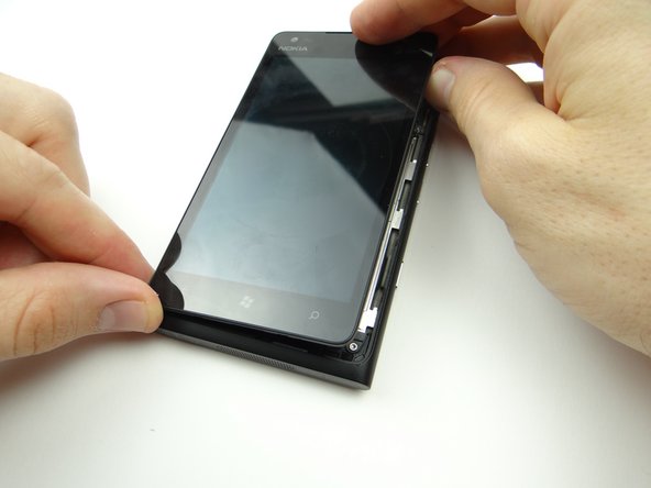 Continue lifting the screen slowly until it reaches a 90° angle.