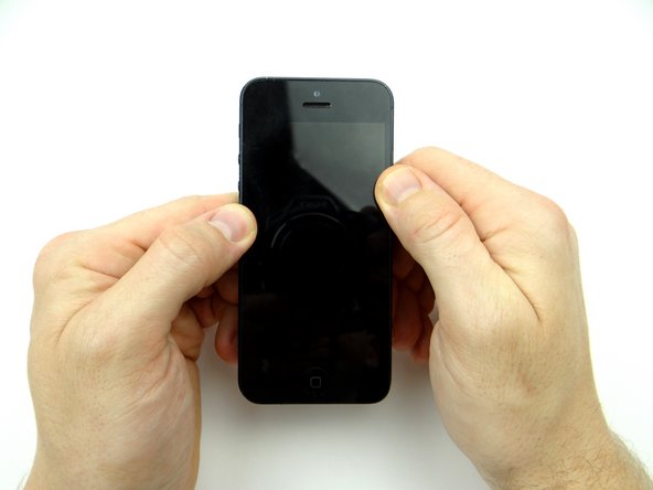 Pictures 2 &amp; 3: Then, push in with your thumbs just below the middle of the display and work your way up.