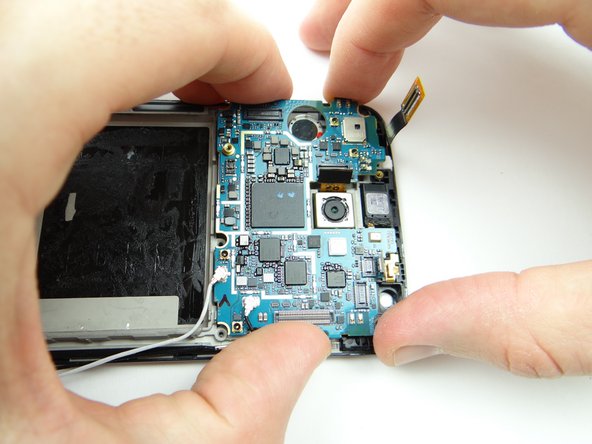 Make sure the logic board is properly aligned as you gently push it into place.