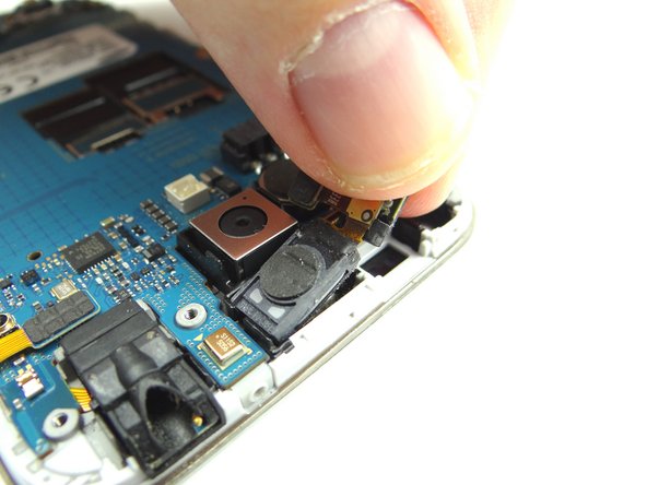 Picture 3: Peel up earpiece speaker / proximity sensor assembly.