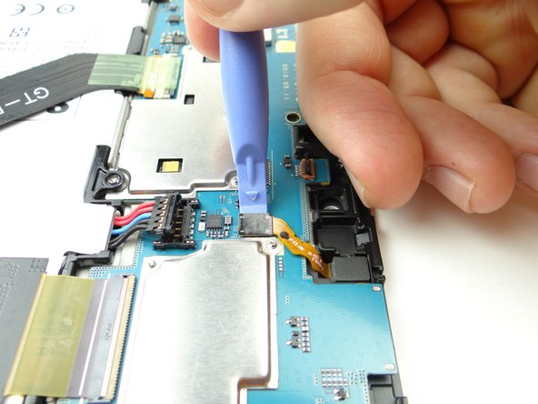 Picture 1: Use blue pry tool to disconnect sensor cable.