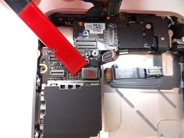 Picture 2: When you release cable '1', it will reveal a hidden power button cable, cable '3' - release it.