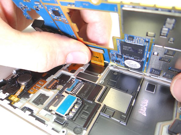 Bring logic board and front panel together at a 45° angle.  Push display cable firmly into place.