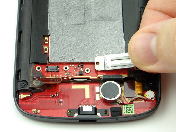 Picture 2: Remove the shield held down by the screws and place it in SLOT 3 (with the screws).