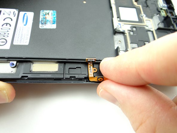 Picture 3: The joint is adhered firmly to the front panel: pinch the cable near the joint and carefully finish peeling up the cable.