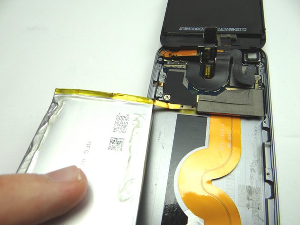 Pictures 1-3: Rotate battery clockwise to fold it away from iPod.