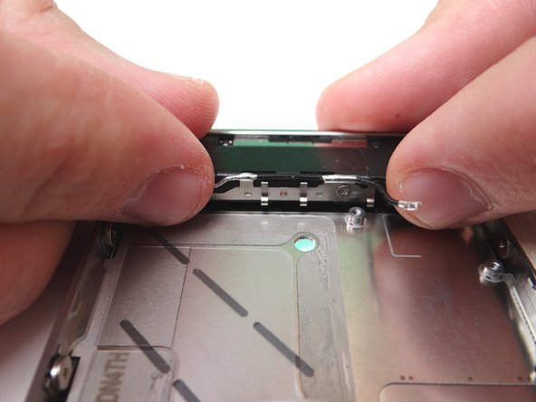 Picture 3: Use your fingers to lift speaker assembly away from mid-frame and place it in COMPARTMENT E.