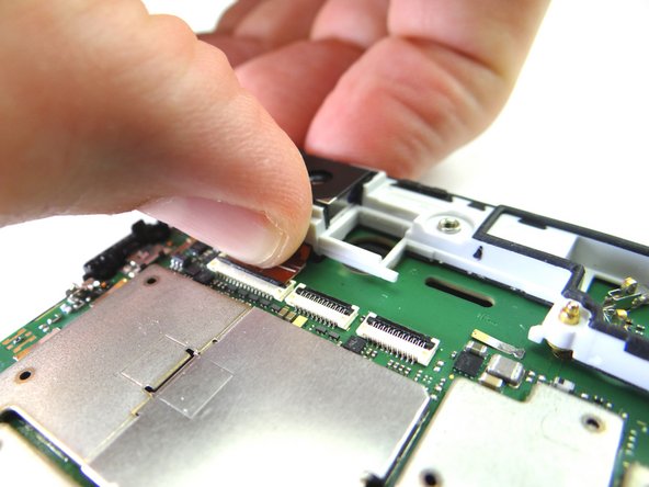 Picture 2: Pull rear camera cable free from ZIF connector.