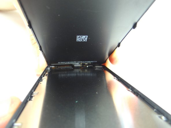 Picture 2: Place the clips at the top of the front panel before seating the rest of front panel.