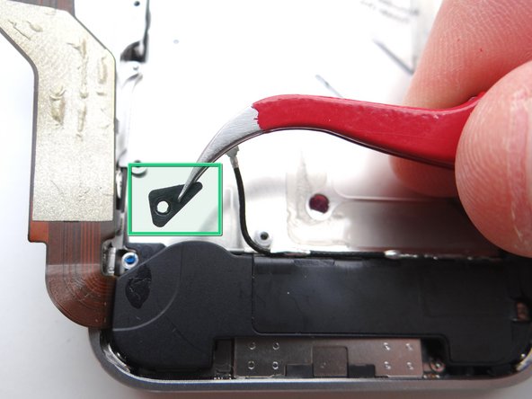 Picture 2: Remove the small plastic Triangular Bracket that was installed under the left-most screw. Place in COMPARTMENT E with the Phillips screws.