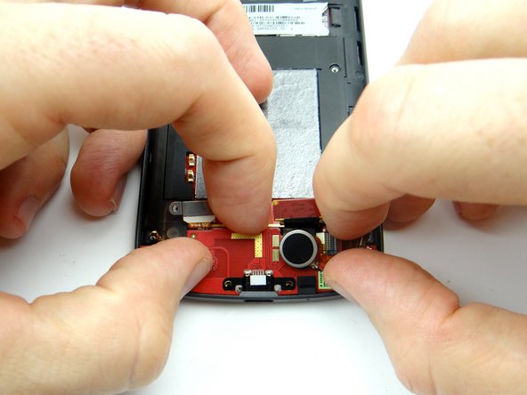 Use your fingers to finish removing the board.