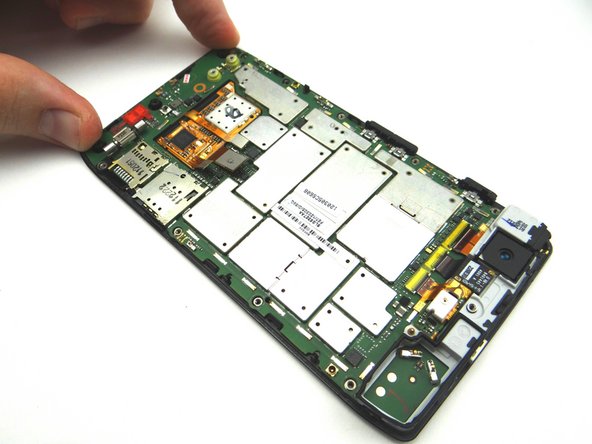 Use your fingers to press the logic board  into place on the display.  This will seat the tabs along the edges of the display.