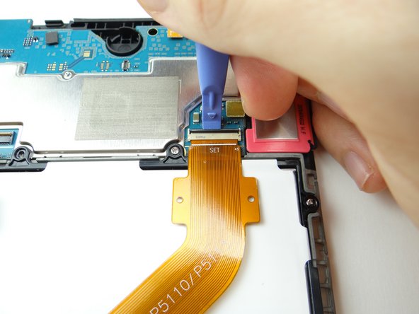 Use blue pry tool to lift the black LCD ZIF connector bar into open position.