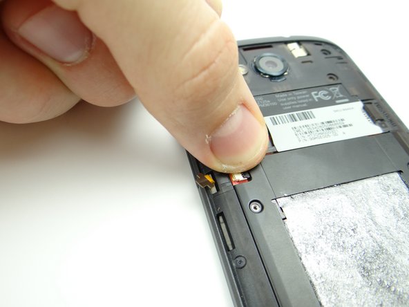 Picture 3: Close the ZIF connector to ensure it doesn't get disturbed/broken as you continue to disassemble the phone.