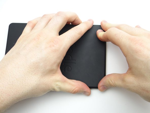 Push the bottom into place and work your way to the top.